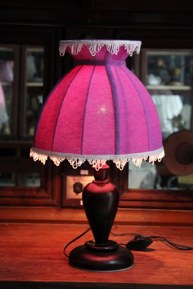 Dress Purple Shade with wooden base table lamp.