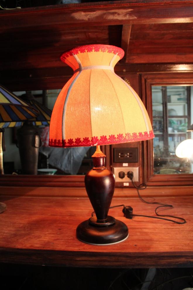 Yellow and red highlight with wooden base table lamp